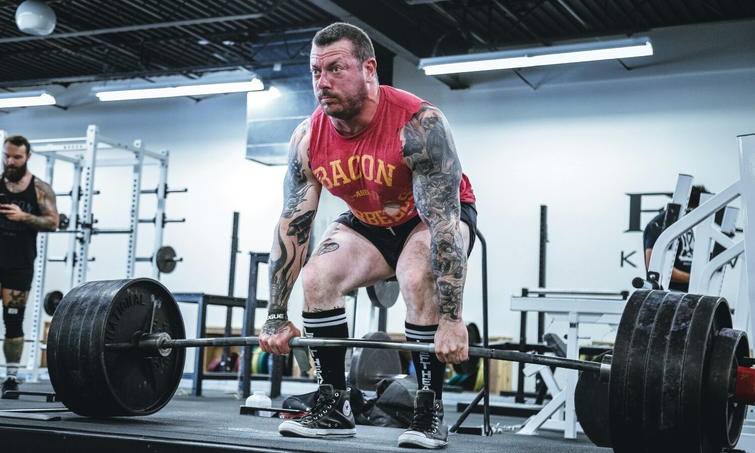 Man deadlifting.