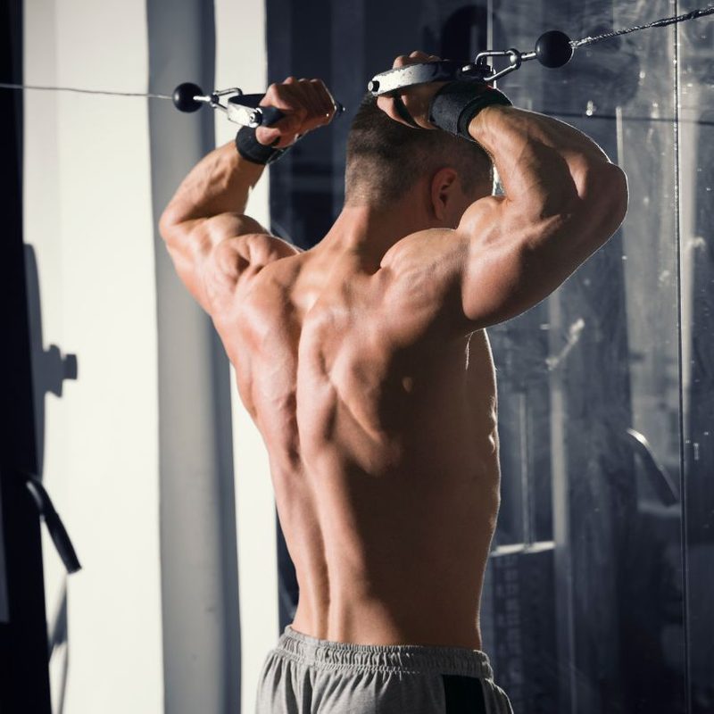 Bodybuilder doing the good morning exercise