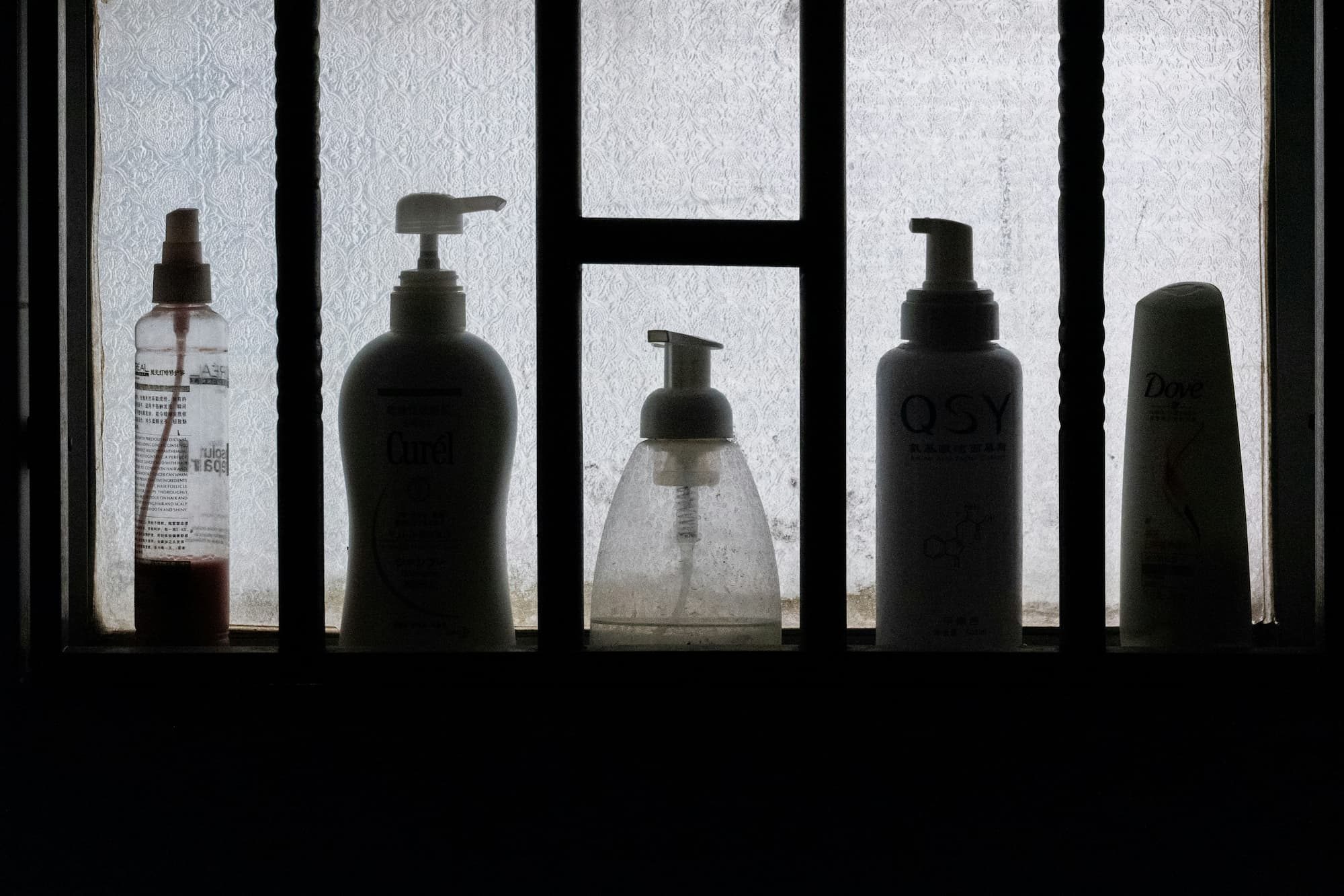 bottles on shelf in shower