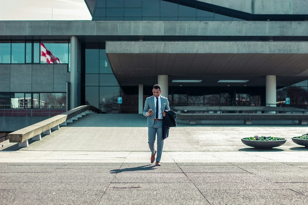man wearing suit with boots