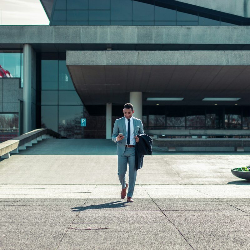 Man wearing suit with boots