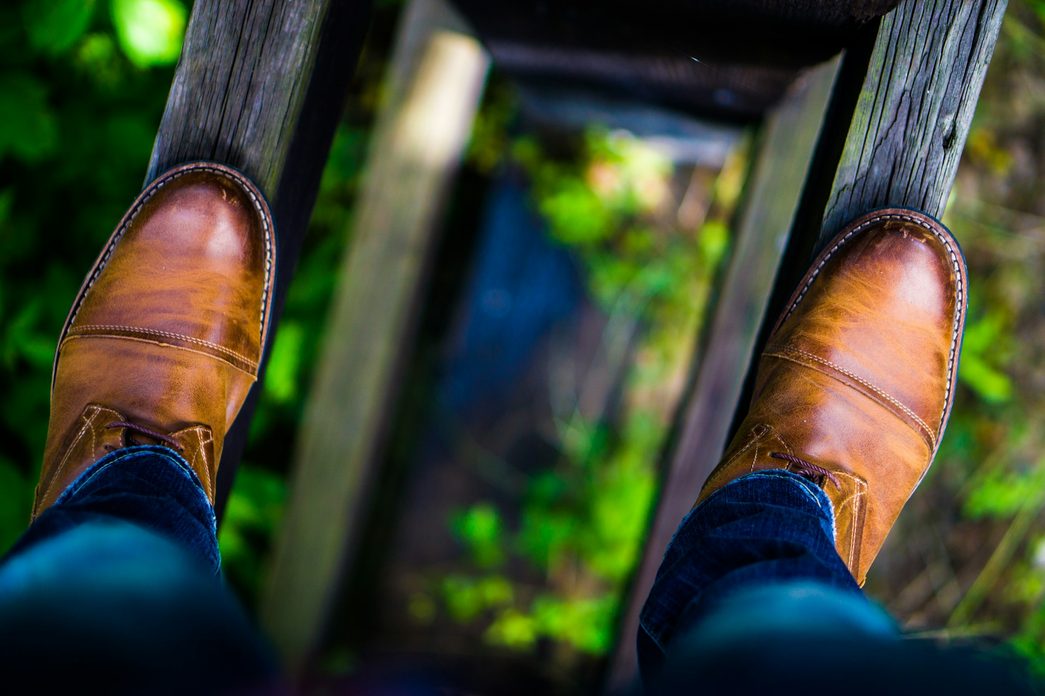 close up on brown leather boots