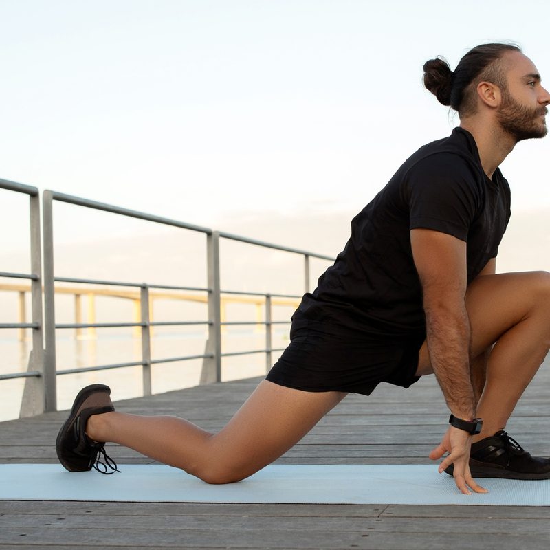Man stretching his hip flexors