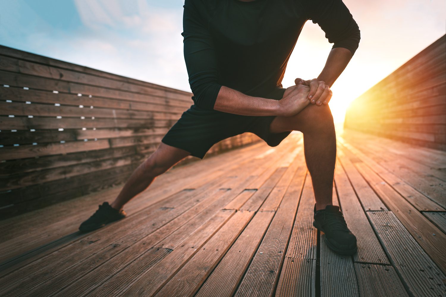 Man stretching his adductors