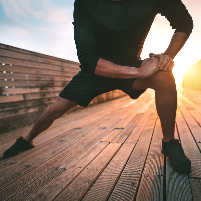 Man stretching his adductors