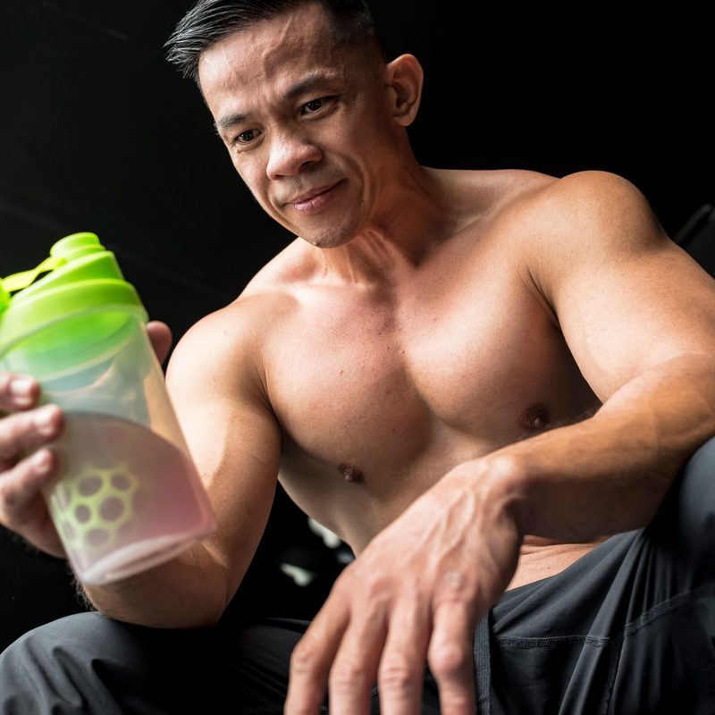 Man with pre-workout drink.