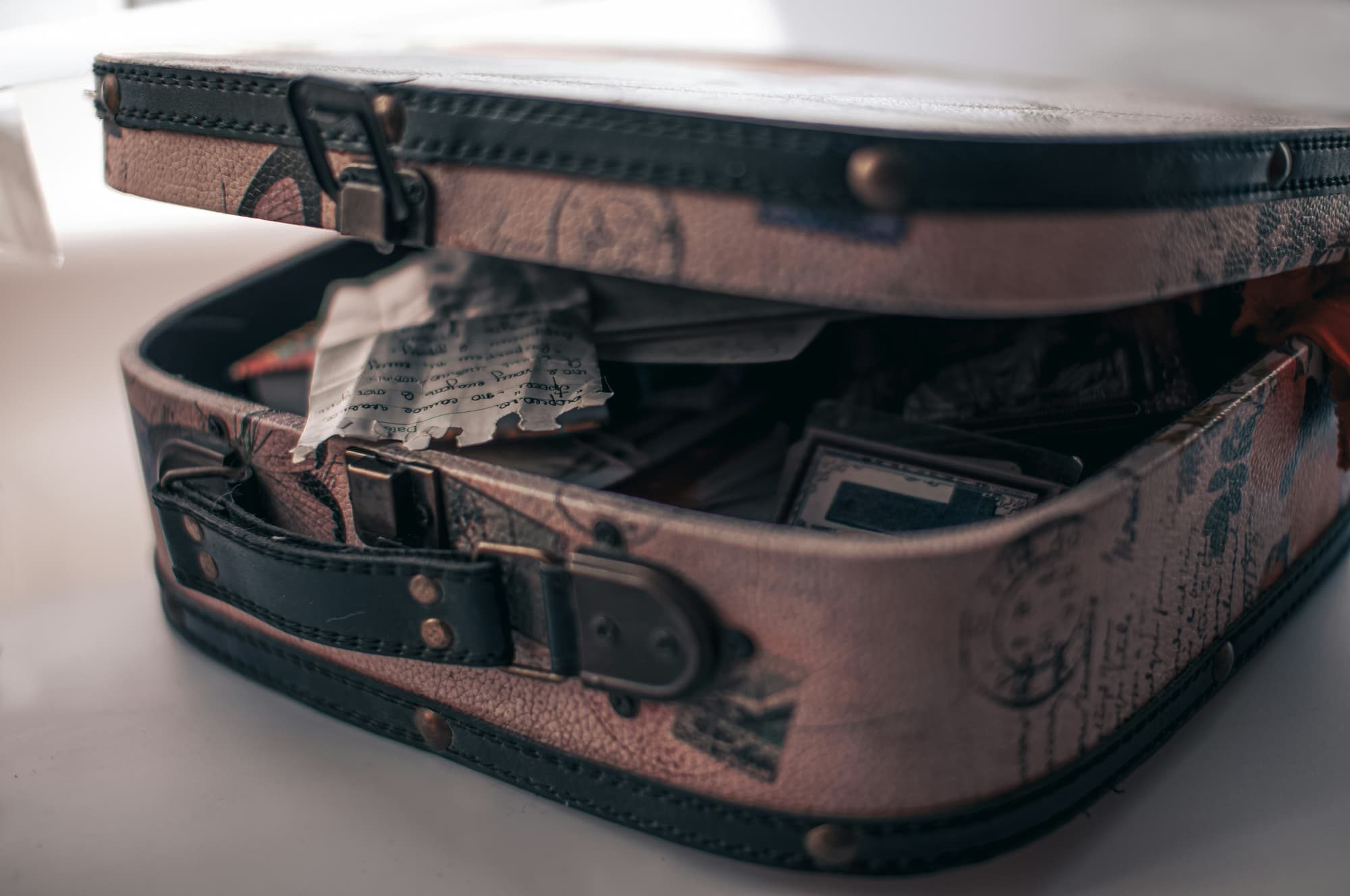 a piece of luggage sitting on the table unzipped