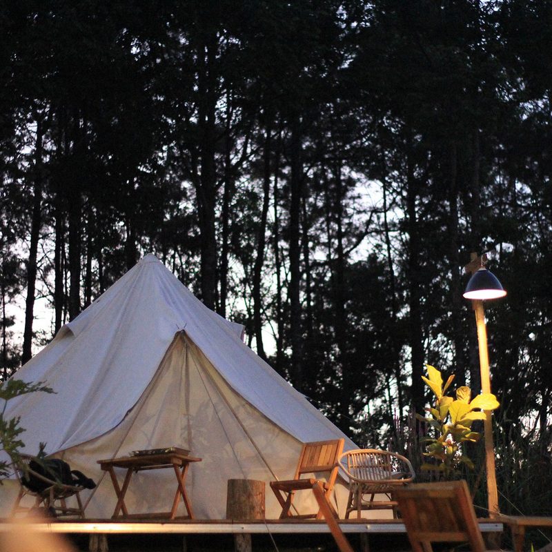 A fancy glamping setup at dusk