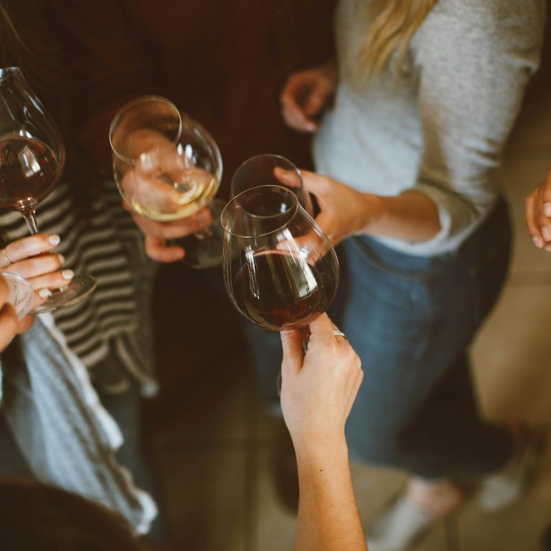 People drinking wine together