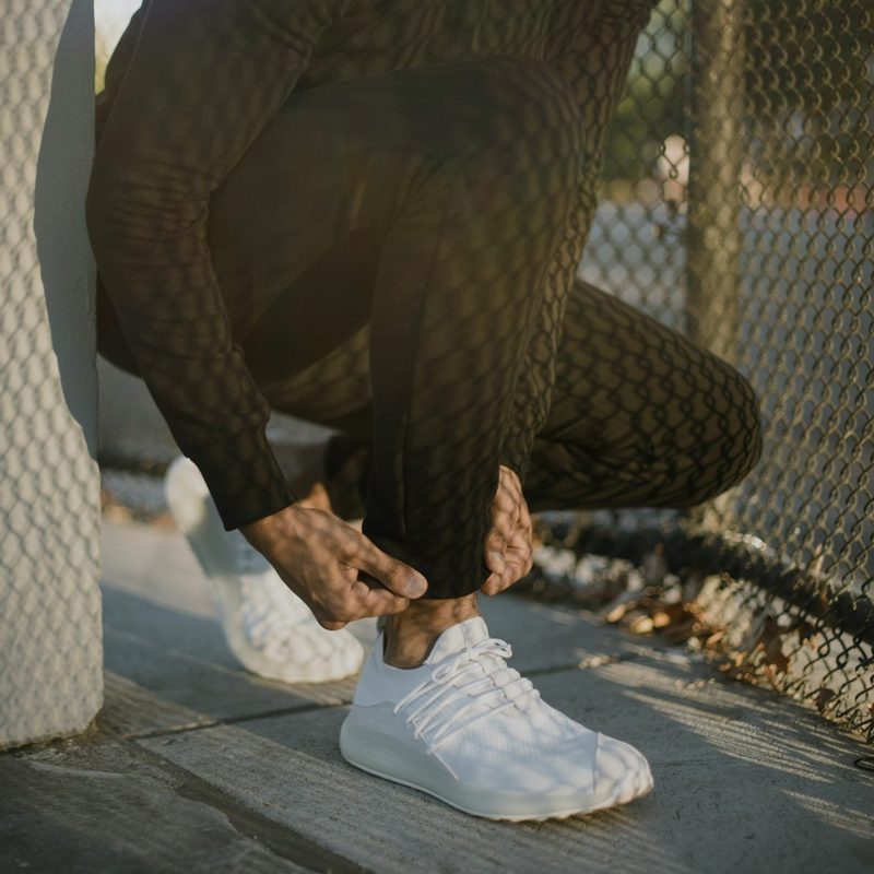 Shot of person wearing athletic shoes