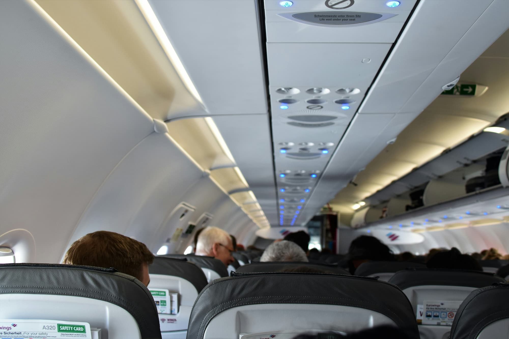 inside of an airplane with people in it