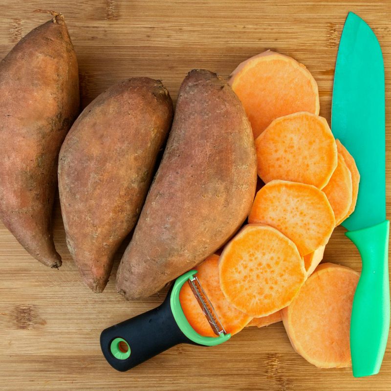 Sweet potatoes, one peeled and sliced