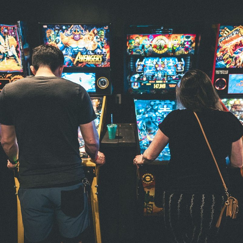 Playing pinball at Cidercade
