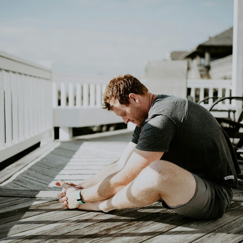 Man doing butterfly stretch