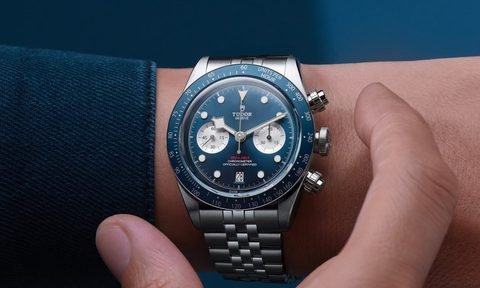 Close-up of Tudor Blue Chrono Black Bay watch on wrist