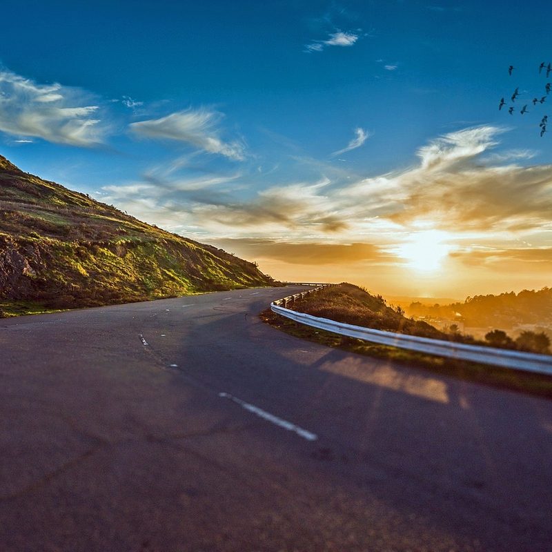 Sunset along winding road