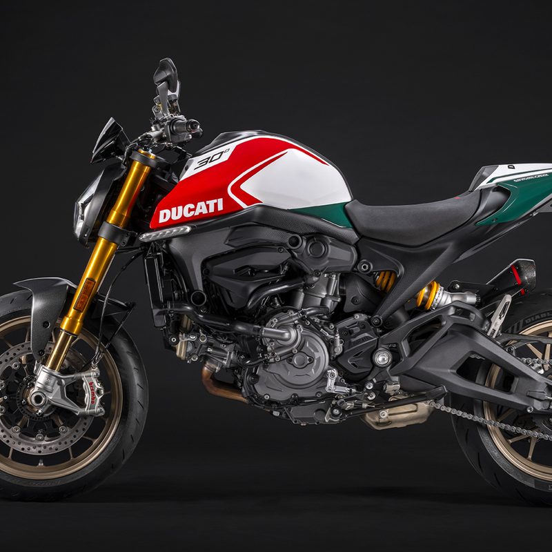 2025 Ducati Monster 30th Anniversary Edition left profile on a black background