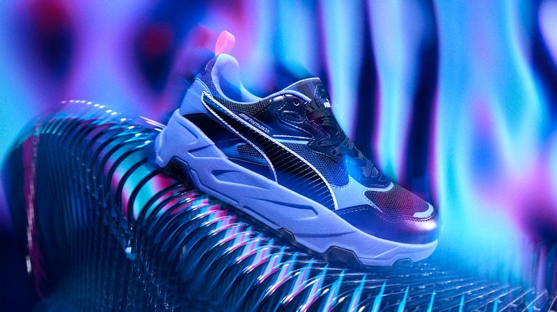 purple and black sneaker among tie dye graphics
