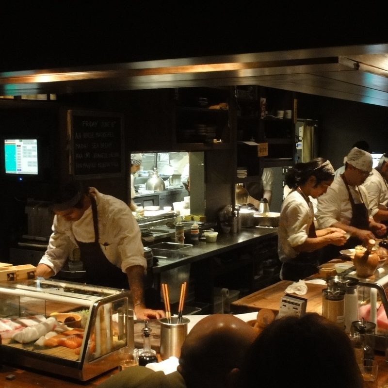 chefs at work at Uchi restaurant