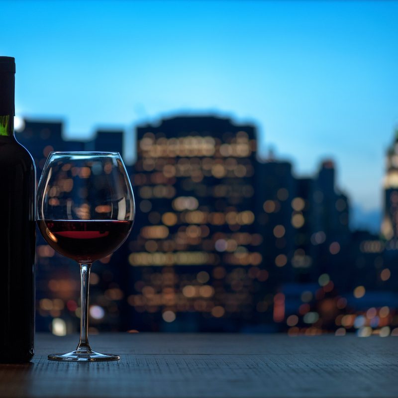 Red wine in front of skyline