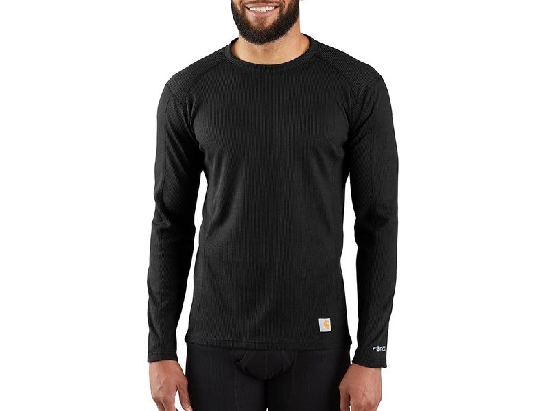 A model wearing the Carhartt Men's Base Force Midweight Classic Crew.