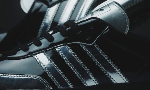side view of silver accents on shoe