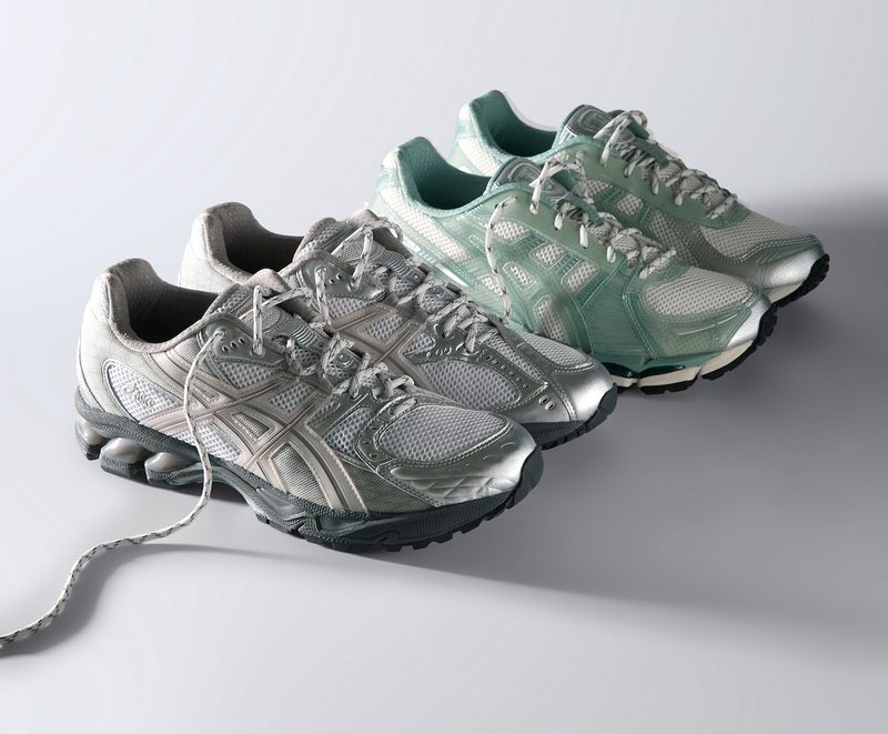 two asics shoes next to each other white floor
