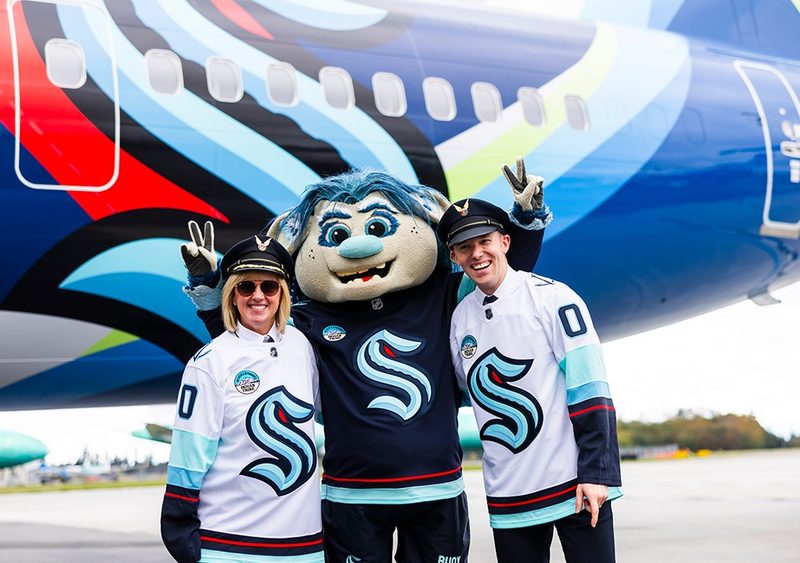 Seattle Kraken mascot and people