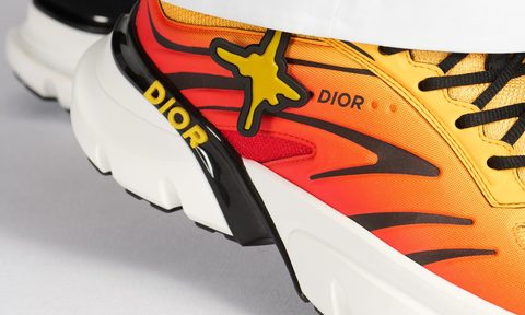 close up on orange sneaker