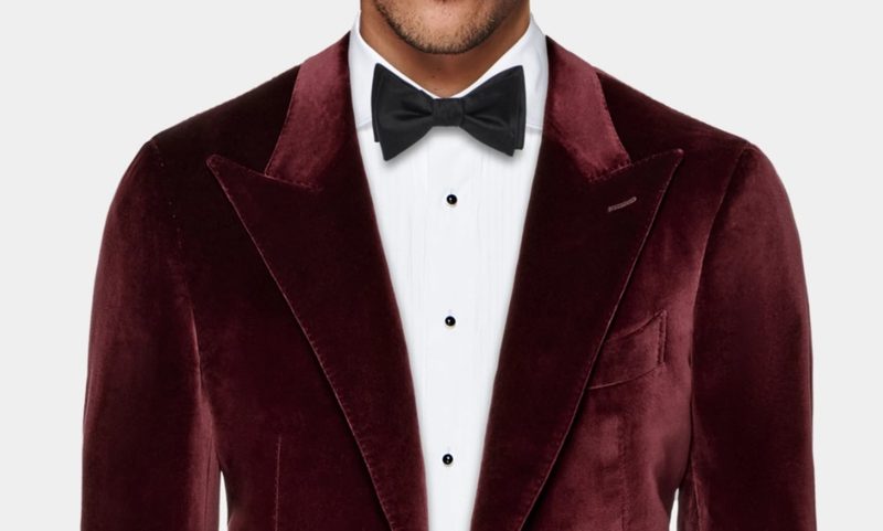 Man in Suitsupply burgundy velvet dinner jacket