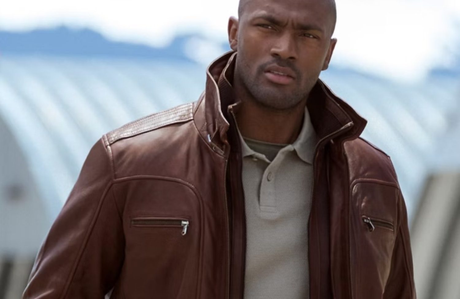 Man in a Overland Sheepskin brown leather jacket