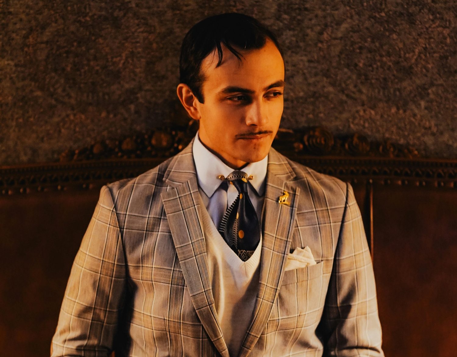 Man in sport coat and sweater
