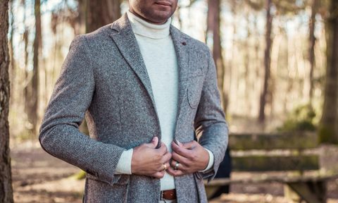 Man in a turtleneck and jacket