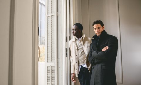 Men in Hockerty at the window