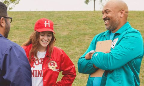 homage x starter people wearing coach jackets