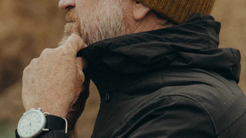 Taylor Stitch man adjusting jacket collar