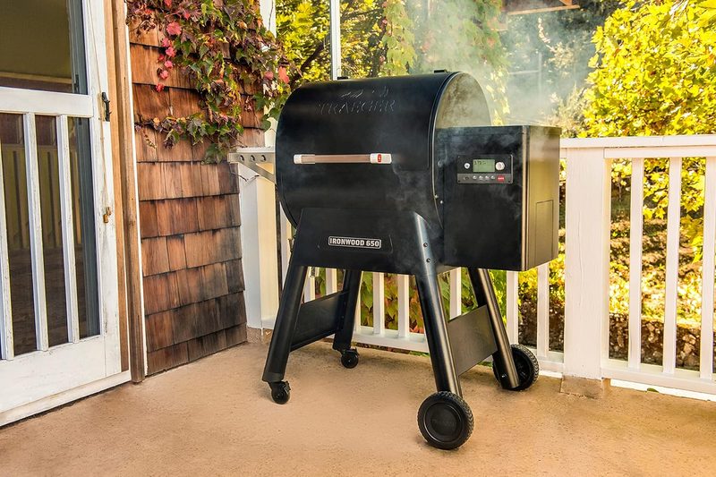 A Traeger Grills Ironwood 650 Electric grill out on the deck.