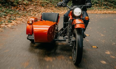 Ural electric sidecar motorcycle concept straight on view.