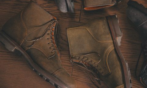 array of boots laying in a group