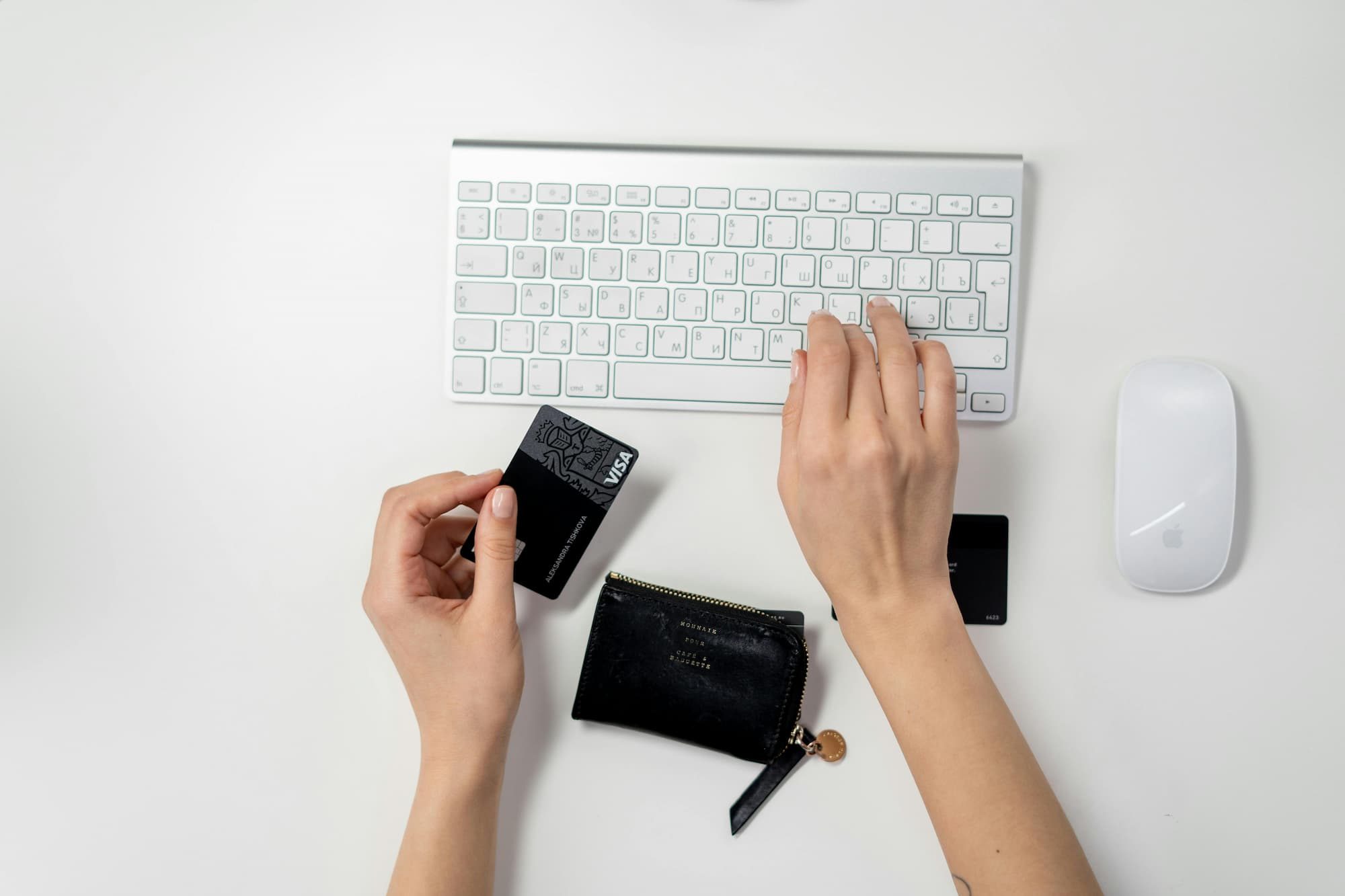 a person paying for something online with a credit card