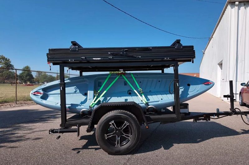 Hiker Trailers' GearLoft trailer in a parking lot with the the upper deck lowered.