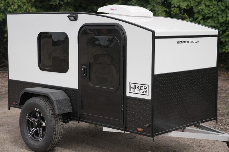 Closeup of the exterior of Hiker Trailers' Highway Lite teardrop trailer.