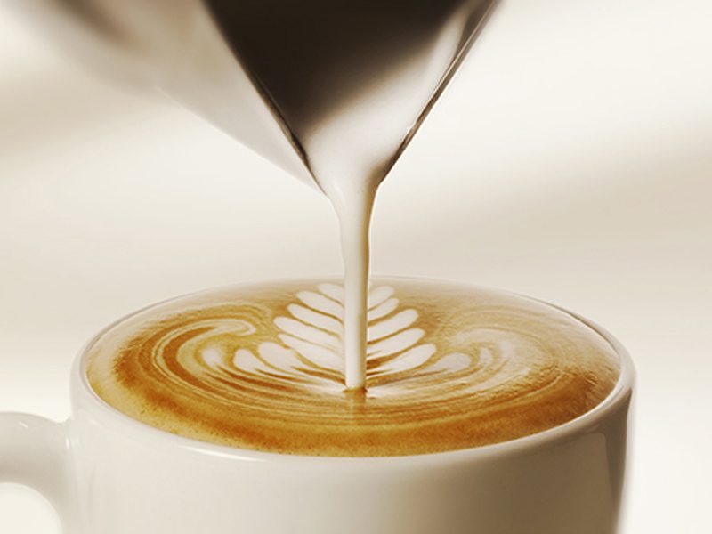 pouring a latte