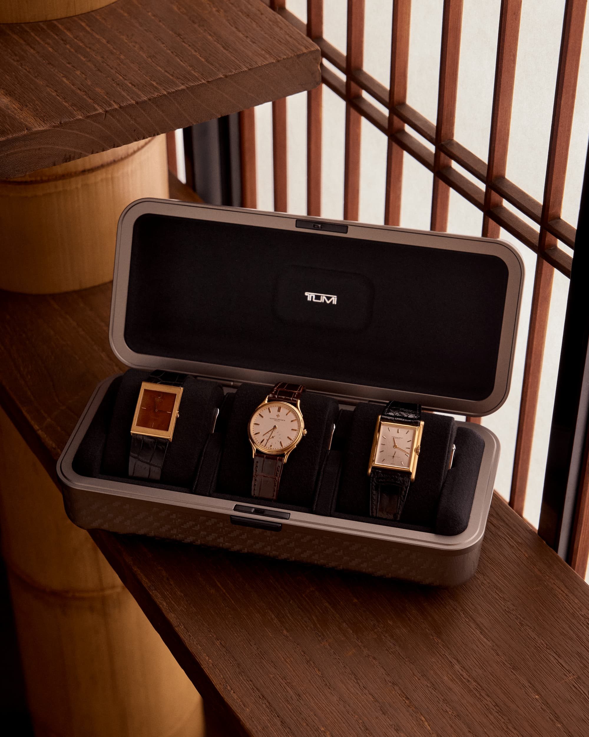 watch case with 3 watches inside