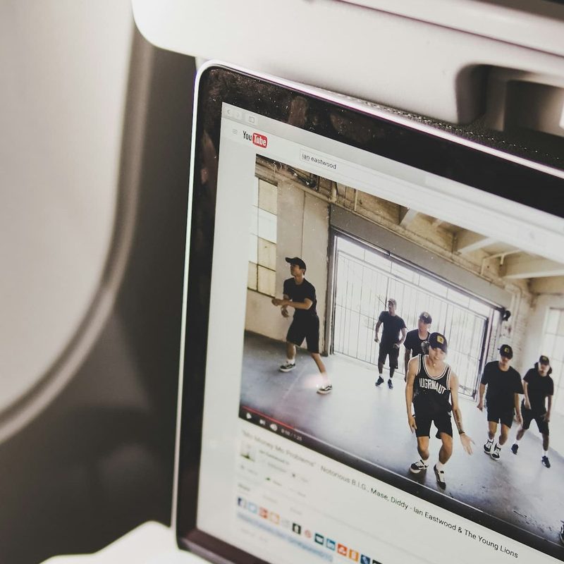 black headphones on a laptop in plane