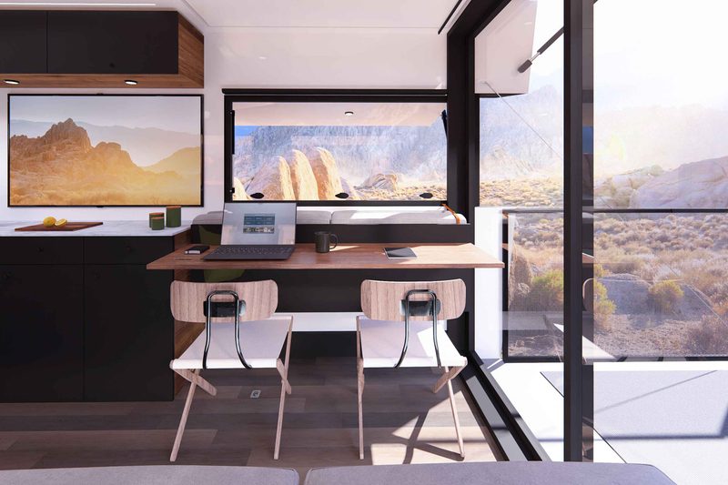 Office workstation inside Living Vehicle's 2025 CyberTrailer travel trailer.