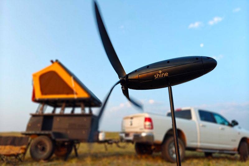 Shine wind turbine setup in the hills of Wyoming.