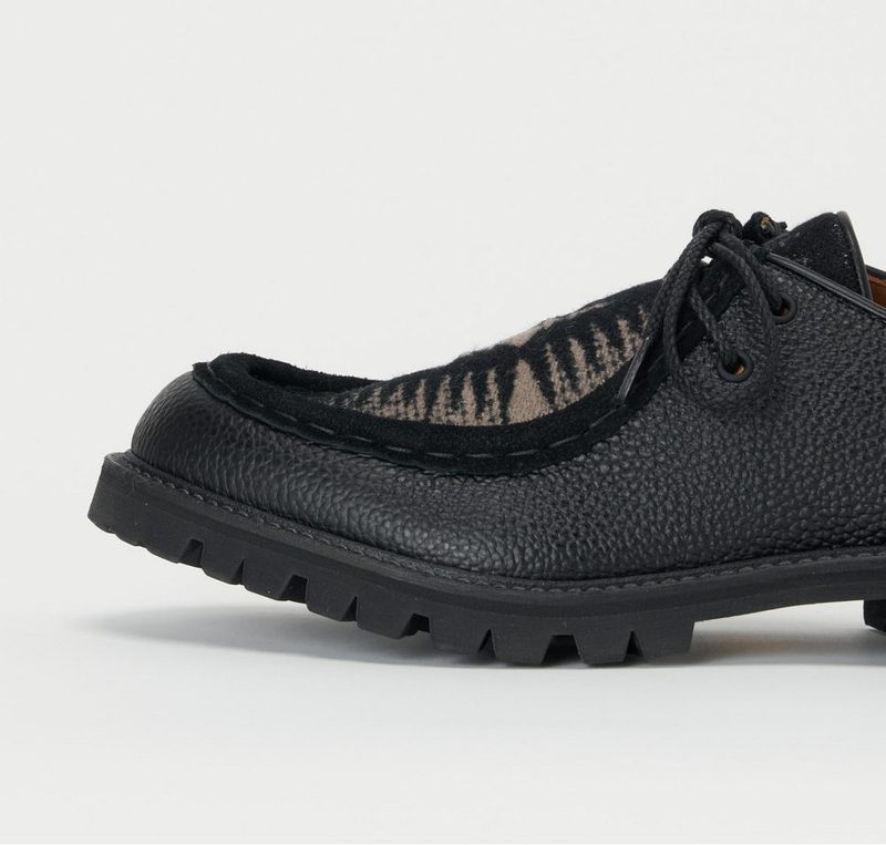 side view of black shoe