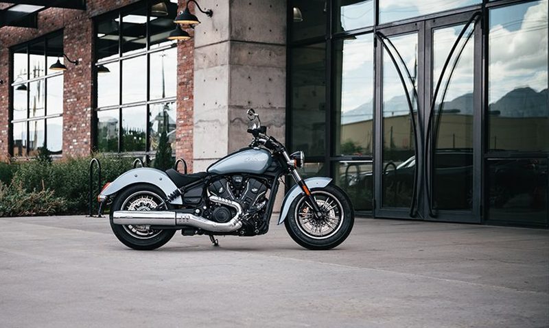 2025 Indian Scout Sixty Classic parked on a concrete entry to an empty restaurant.