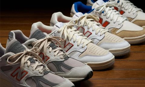 sneakers lined up on wood floor